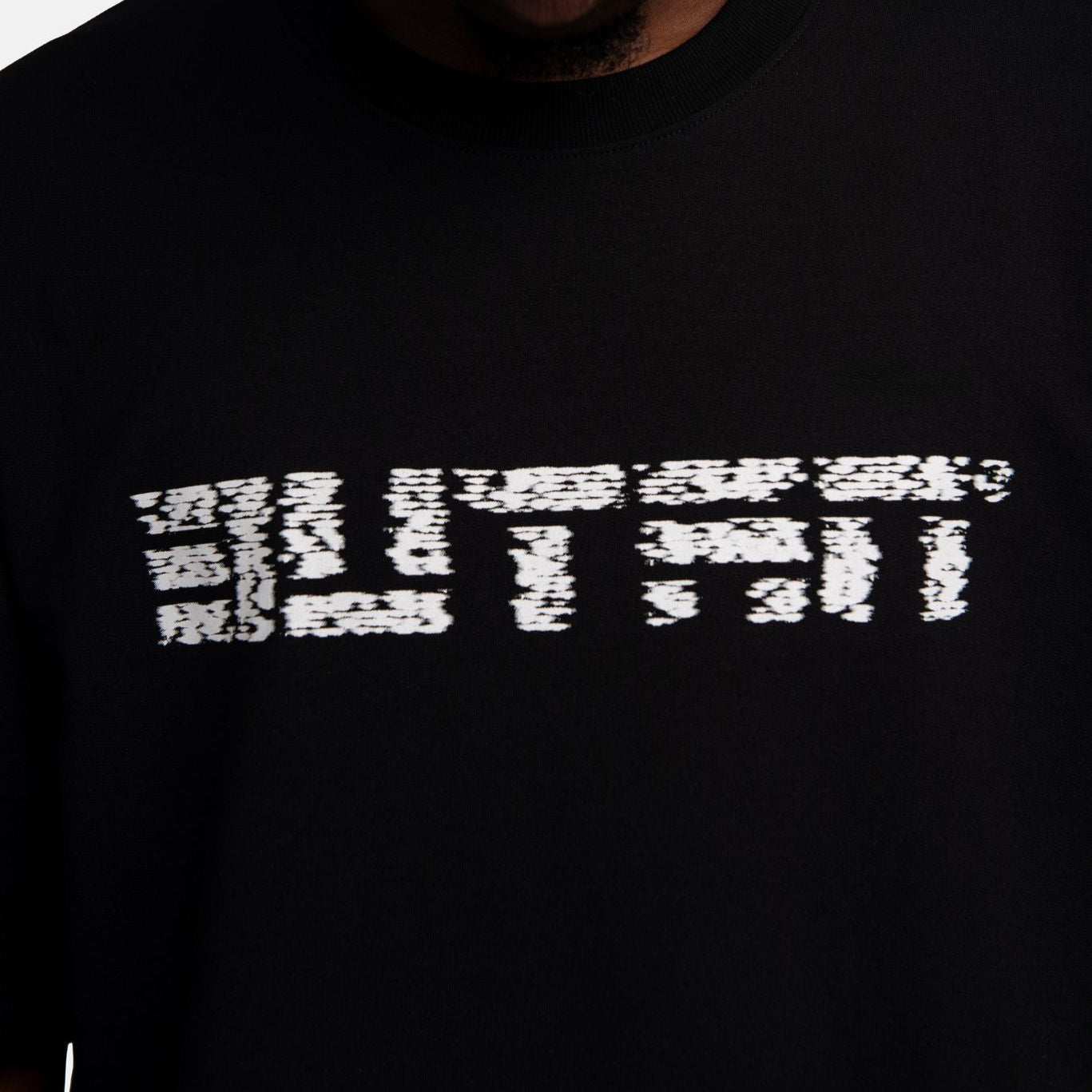 Butan Aluta Mask | White Noise | Oversized T-shirt in Black