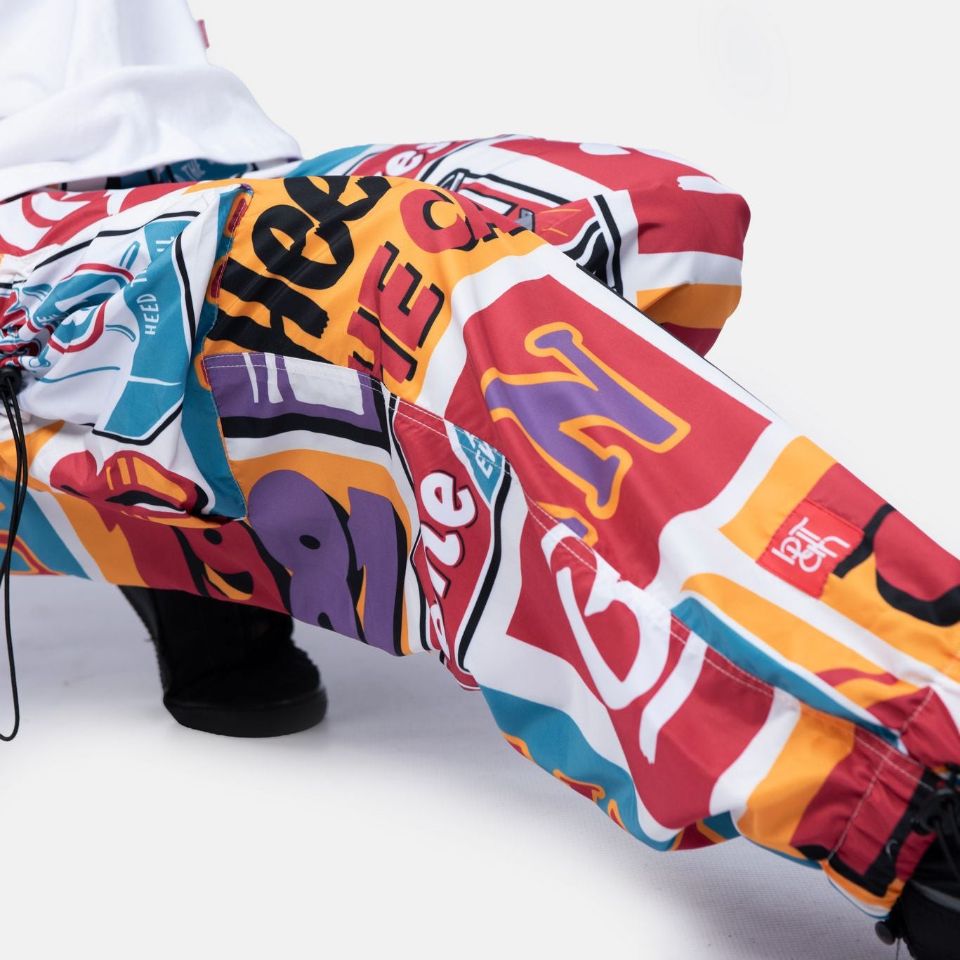 Colorful graffiti-style glove on a white background