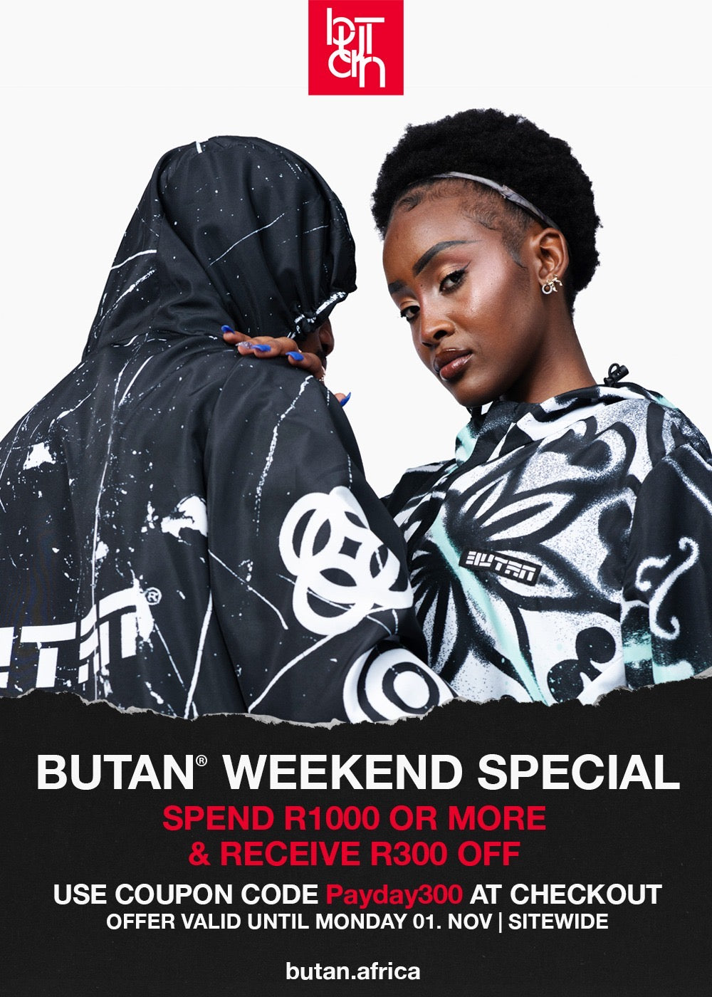 A promotional fashion ad featuring two models wearing Butan brand hooded tops with black, white, and gray graphic patterns. The left model wears a solid black hooded top, while the right model wears a matching patterned top.